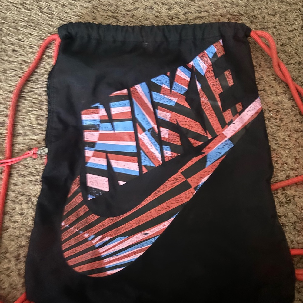 Nike Black Drawstring Bag with Red and Blue Logo